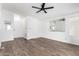 Inviting living room with wood flooring, fan and plenty of natural light at 1784 E Torrey Pines Ln, Chandler, AZ 85249