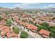 Aerial view showcasing the neighborhood's landscape, houses, and mountain backdrop at 1813 E Sheena Dr, Phoenix, AZ 85022