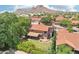 Aerial view of home with mountain backdrop at 1813 E Sheena Dr, Phoenix, AZ 85022