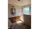 Updated bathroom featuring a walk-in shower with glass door and a vanity with sink at 1813 E Sheena Dr, Phoenix, AZ 85022