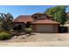 Charming single-Gathering home showcasing a well-maintained red tile roof and two-car garage at 1813 E Sheena Dr, Phoenix, AZ 85022