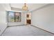 Carpeted Living room with large windows providing ample light at 1813 E Sheena Dr, Phoenix, AZ 85022