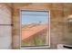 Bathroom window reveals a beautiful mountain view and a desert neighborhood at 1813 E Sheena Dr, Phoenix, AZ 85022