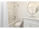 A bathroom features a shower and modern fixtures at 18614 E Oriole Way, Queen Creek, AZ 85142