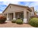 Charming covered front porch adorned with seating, offering a relaxing outdoor space at 18614 E Oriole Way, Queen Creek, AZ 85142