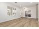 Spacious living room featuring a bright open space, hardwood floors and natural light at 18614 E Oriole Way, Queen Creek, AZ 85142