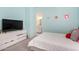 Bright bedroom with light blue walls and access to bath at 20496 W Valley View Dr, Buckeye, AZ 85396