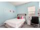 Comfortable bedroom with light blue walls and modern decor at 20496 W Valley View Dr, Buckeye, AZ 85396
