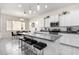 Modern kitchen island with seating, granite countertops, stainless steel appliances, and ample storage space at 20496 W Valley View Dr, Buckeye, AZ 85396
