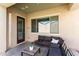 Covered patio featuring an outdoor seating area and a view of the backyard at 20496 W Valley View Dr, Buckeye, AZ 85396