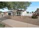 Charming single-story home with a well-manicured front yard and desert landscaping at 20823 S 185Th Way, Queen Creek, AZ 85142