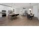 Open-concept living space with modern kitchen, dining area, and living room at 20823 S 185Th Way, Queen Creek, AZ 85142