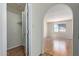Bright bedroom with wood floors and a large window offering a pleasant view at 2164 S Estrella Cir, Mesa, AZ 85202