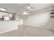 Spacious living area open to the kitchen, offering a versatile living space at 2301 E University Dr # 172, Mesa, AZ 85213