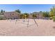 Community playground with swings and play structures offers a safe and fun recreational space at 2301 E University Dr # 172, Mesa, AZ 85213
