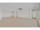 Spacious living area with hardwood floors and an open floor plan at 23036 E Oriole Way, Queen Creek, AZ 85142