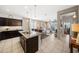 Open-concept kitchen seamlessly connects to the dining and living areas, promoting social gatherings at 23690 W Ripple Rd, Buckeye, AZ 85326