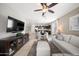 Spacious living room offers an inviting open floorplan and stylish design elements at 23690 W Ripple Rd, Buckeye, AZ 85326