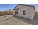 Low maintenance backyard featuring desert landscaping, patio, and block wall for privacy at 25109 N 174Th Ln, Surprise, AZ 85387