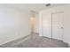 Bedroom featuring carpeted floors and closet storage at 25109 N 174Th Ln, Surprise, AZ 85387