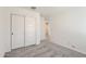 Bedroom featuring carpeted floors and closet storage at 25109 N 174Th Ln, Surprise, AZ 85387