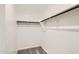 Walk-in closet featuring clothing rods for storage at 25109 N 174Th Ln, Surprise, AZ 85387