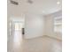 Bright living area with tile floors, neutral paint, and sliding doors leading to the backyard at 25109 N 174Th Ln, Surprise, AZ 85387