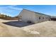 Home exterior featuring a covered patio and spacious backyard at 29402 W Mitchell Ave, Buckeye, AZ 85396