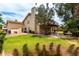 View of the house from the backyard, featuring a patio, balcony, and tile roof at 3337 E Glade Cir, Mesa, AZ 85204