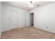 Bedroom with tan carpet and neutral colored walls at 3337 E Glade Cir, Mesa, AZ 85204