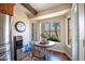 Bright breakfast nook offering an inviting space with views of the lake at 3441 N 162Nd Ln, Goodyear, AZ 85395
