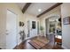 Attractive foyer with hardwood floors, decorative accents, and an open view into the living room at 3441 N 162Nd Ln, Goodyear, AZ 85395