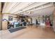 Spacious garage with ample storage, a clean floor, shelving units, and organized items at 3441 N 162Nd Ln, Goodyear, AZ 85395