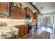 Well-appointed kitchen with granite countertops, and stainless steel appliances at 3441 N 162Nd Ln, Goodyear, AZ 85395