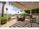 Entertaining patio provides both dining and bar seating with lovely views overlooking the golf course at 3441 N 162Nd Ln, Goodyear, AZ 85395