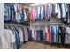 Spacious walk-in closet with well-organized clothing racks and ample storage space at 3441 N 162Nd Ln, Goodyear, AZ 85395
