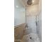Modern bathroom shower features beautiful tile work and a corner seat for added convenience at 402 E Claremont St, Phoenix, AZ 85012