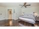 Spacious primary bedroom with hardwood floors and a sitting area at 402 E Claremont St, Phoenix, AZ 85012