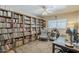 Charming bedroom features custom built-in bookshelves, creating a cozy and organized space at 402 E Claremont St, Phoenix, AZ 85012