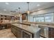 Gourmet kitchen features granite countertops, stainless steel appliances, and ample cabinet space at 402 E Claremont St, Phoenix, AZ 85012