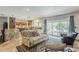 Inviting living room with access to the patio and backyard pool area at 402 E Claremont St, Phoenix, AZ 85012