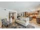 Open-concept living room showcases seamless flow to the kitchen and dining area at 402 E Claremont St, Phoenix, AZ 85012