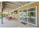 Covered patio offering outdoor dining, access to backyard with sliding glass doors at 402 E Claremont St, Phoenix, AZ 85012