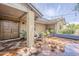 Inviting brick patio with comfortable seating and shaded pergola, ideal for relaxation at 402 E Claremont St, Phoenix, AZ 85012