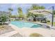 Inviting pool area featuring desert landscaping and comfortable patio seating at 402 E Claremont St, Phoenix, AZ 85012