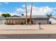Charming single story home with brick accents, desert landscaping, and attached two car garage at 4062 W Mescal St, Phoenix, AZ 85029