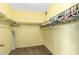 A walk-in closet equipped with rods for organized hanging clothing storage at 4062 W Mescal St, Phoenix, AZ 85029