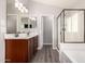 Bathroom features dual sinks, framed mirrors, and glass shower at 4142 E Sandy Way, Gilbert, AZ 85297