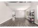 Spacious living room features vaulted ceiling, wood floors, neutral walls, and lots of natural light at 4142 E Sandy Way, Gilbert, AZ 85297