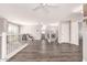 Open loft with wood floors, iron railing, and plenty of space for recreation or relaxation at 4142 E Sandy Way, Gilbert, AZ 85297